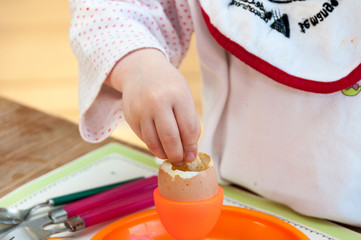 Child eating soft boiled egg