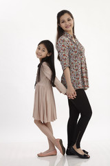 mothe and daughter back to back