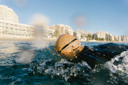Diver running into water