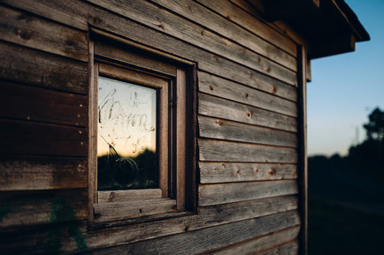 Window detail in a wooden cabin