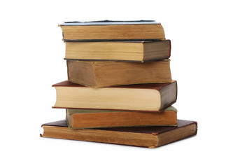 Stack of old antique big books isolated on white background