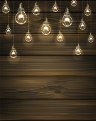 Brown vector wooden background with light bulbs. Edison's lamps hang on wires from the ceiling and illuminate the space for your text.