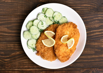 Schnitzel with cucumber salad