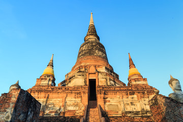 The Big pagoda in ancient ruin in Ayuttaya with sunligth in the morning.