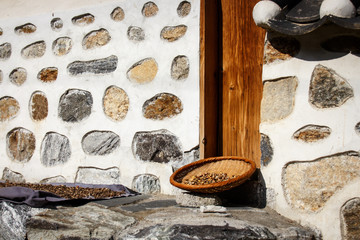 Korean traditional tile and wall. Korean colander beside the wall.