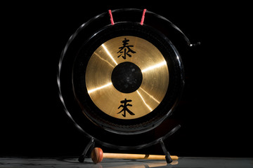 Closeup of a small chinese table gong