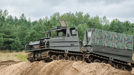 Fototapeta premium ARTICULATED ALL-TERRAIN TRACKED CARRIER - Military vehicle