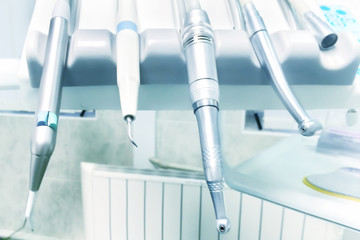 Dental drills, instruments and tools in dentists office. Closeup macro shot