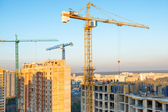 Cranes on industrial building site