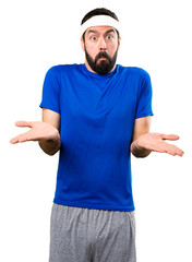 Funny sportsman making unimportant gesture on isolated white background