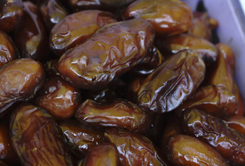 Bowl of pitted dates , top view