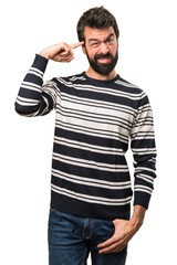 Man with beard making crazy gesture