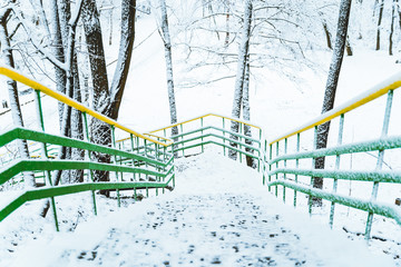 The stairs are covered in snow