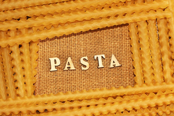 Italian pasta and lettering wooden letters