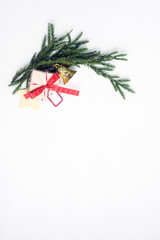 Flat lay top view Christmas border frame made of fir branches, toys and gifts. New year concept. Text space