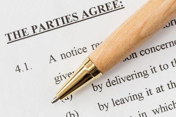 Pen over a printed agreement