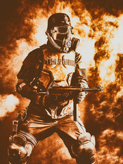 Futuristic nazi soldier in fire and smoke gas mask and steel helmet with schmeisser handgun