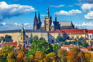 Fototapeta na wymiar Prague fall landscape view to Saint Vitus Cathedral with blue