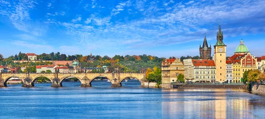 Zelfklevend Fotobehang Fall landscape view to Charles bridge on Vltava river in Prague © Yasonya