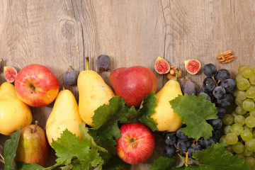 assortment of fruit on wood