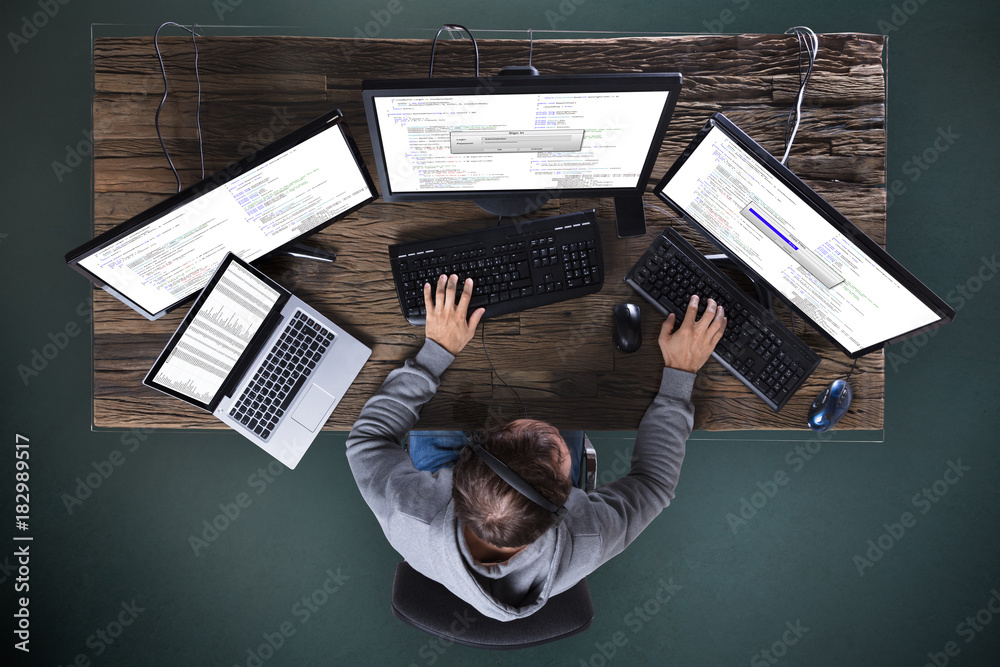 Fototapete Hacker Stealing Data From Multiple Computer