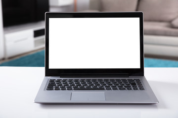 Fototapeta premium Close-up Of Laptop On Desk