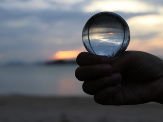 Crystal ball holding in hand