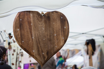 close up of wooden object in the shape of a heart