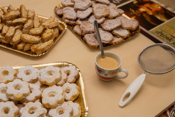 close up typical genoese biscuits canestrelli and cantucci with cup of coffee