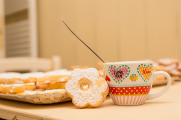 cup of coffee decorated with typical Italian biscuits