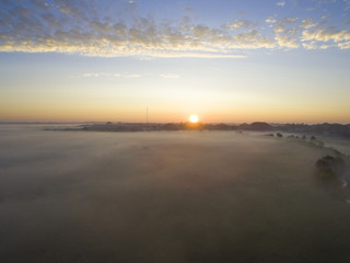 Sunrise fog over the river