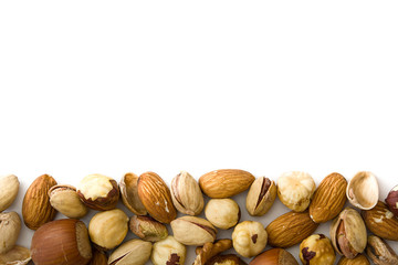 Assorted mixed nuts pattern isolated on white background. Top view

