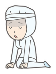 A female worker wearing white sanitary clothes sits on the floor and is sighing