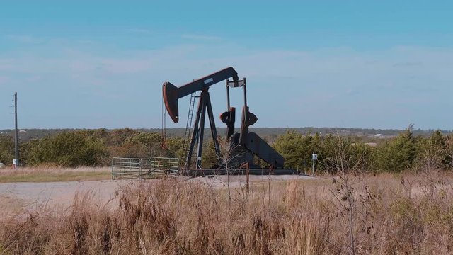 Oil pump in the countryside of Oklahoma - Pump jack