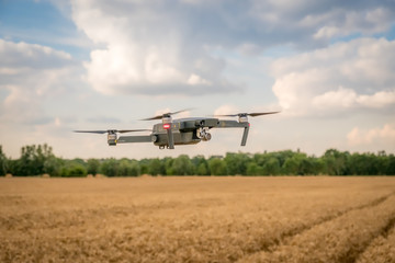 Fototapeta na wymiar Photo of drone on a wheat field