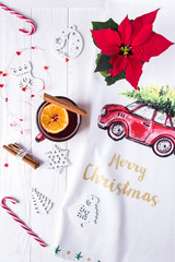 Merry Christmas and Happy New Year. Christmas mulled wine on a white wooden background. Christmas composition