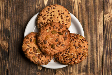 Cookie made of oatmeal on wooden background