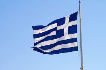 A gigantic Greek flag on the Athenian Acropolis, Greece.