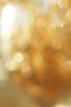 Bokeh defocused gold abstract background vertical