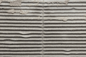 Gray striped old corrugated cardboard, background