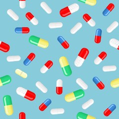 Vector pills and capsules in different colors, shapes and sizes, isolated elements. Seamless background, pattern