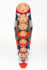 Set of Russian dolls babushka matryoshka lined up one behind other in growth