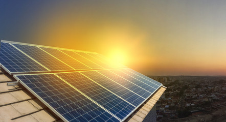 Solar Panel Photovoltaic installation on a Roof, alternative electricity source - Concept Image of...