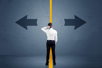 Business person choosing between two options separated by a yellow border arrow