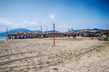 Fototapeta premium Evia, Greece july 20, 2014: A beautiful beach with a cafe bar and a beach volleyball court