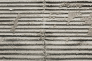 Gray striped old corrugated cardboard, background