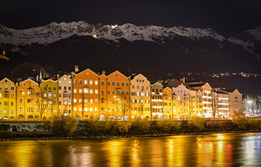 Fototapeta na wymiar View to Innsbruck with snowy peaks at night