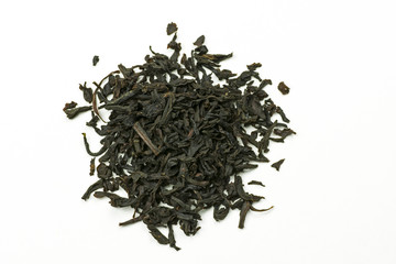 Pile of leaves  Earl Gray black tea on white background