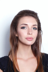Fototapeta premium Beautiful young woman standing, isolated on white background. Sexy woman
