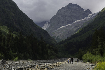 Walk near the mountain river. Caucasus.